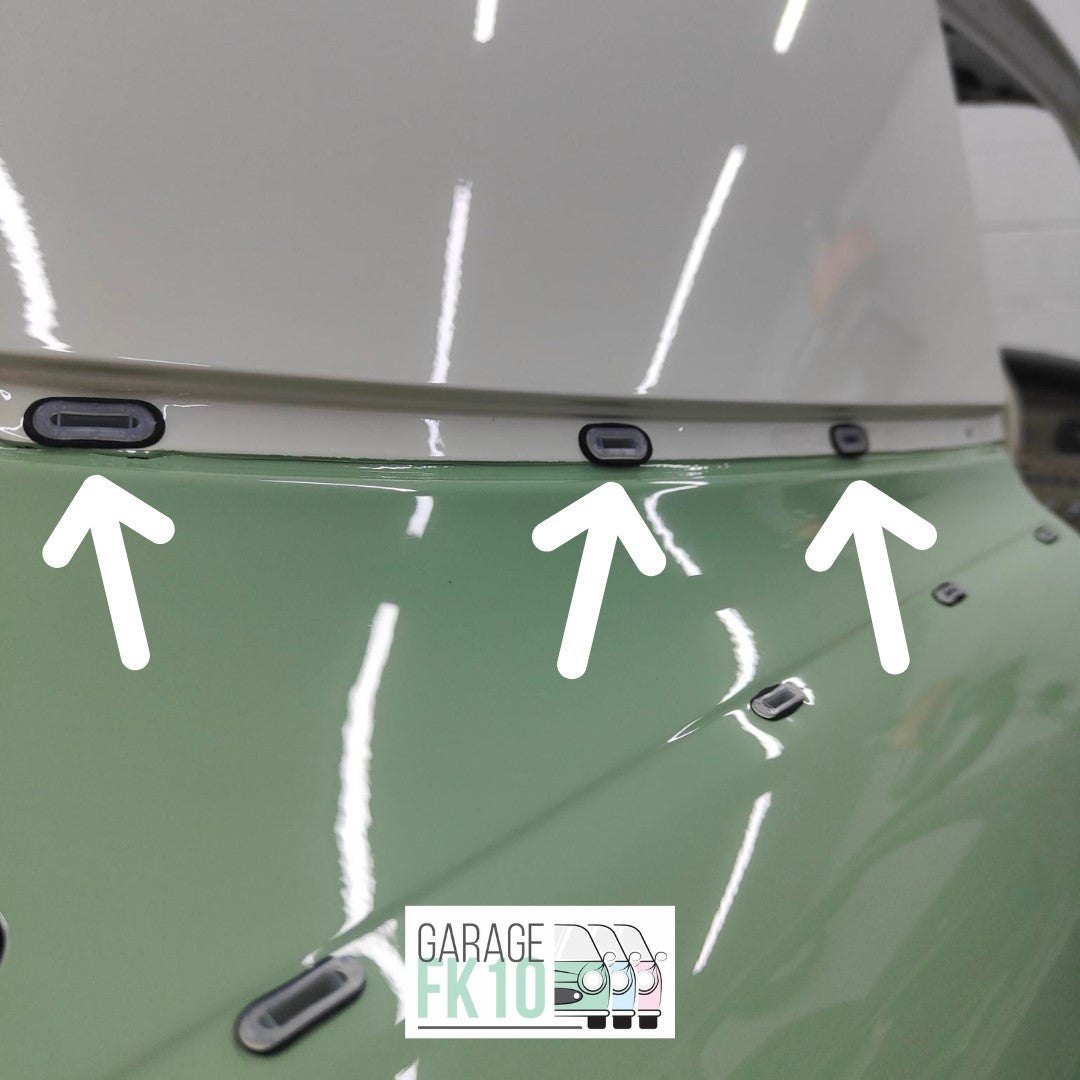 Nissan Figaro upper quarter panel white trim grommet